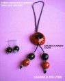 COLLAR Y PENDIENTES  EN TAGUA Y CUERO